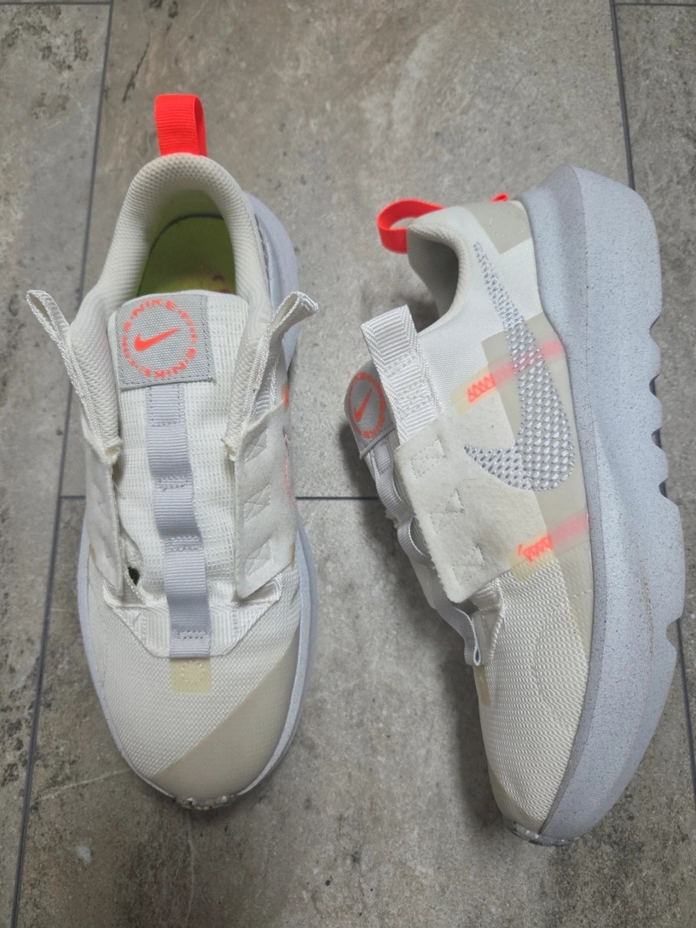- Nike Kids Cream Sneakers with Neon Coral Accents